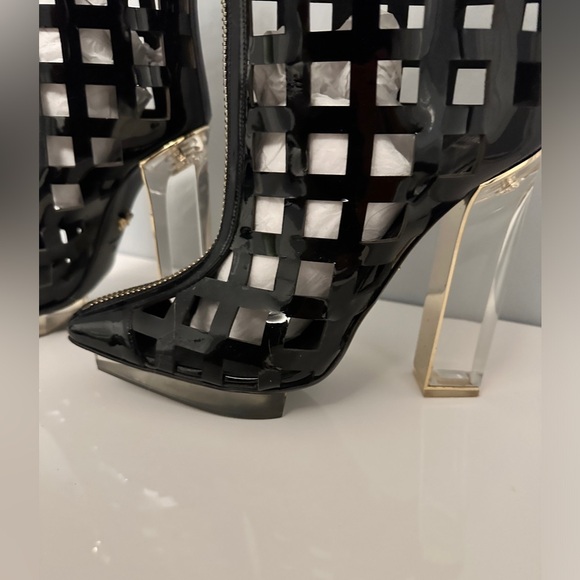 Versace Boots 
Glamorous and stylistic. This statement piece was  worn once. - Picture 7 of 12